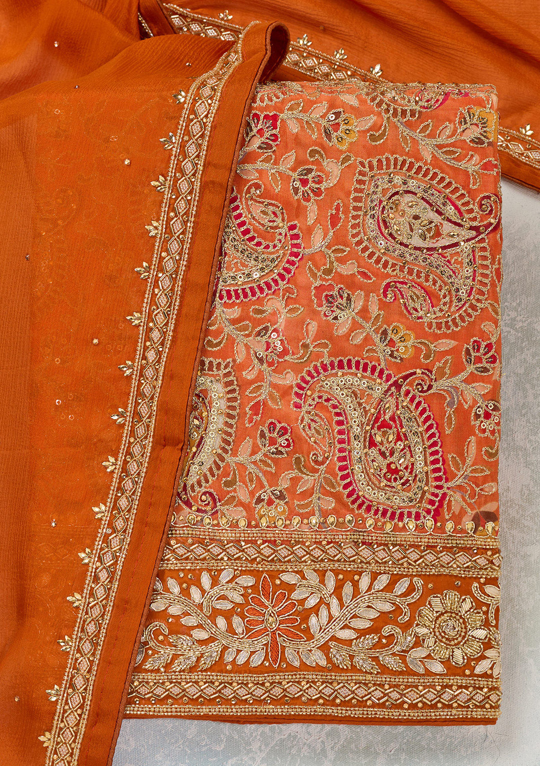 Orange Crepe Gold Stonework Unstitched Dress Material With Matching Bottom And Dupatta