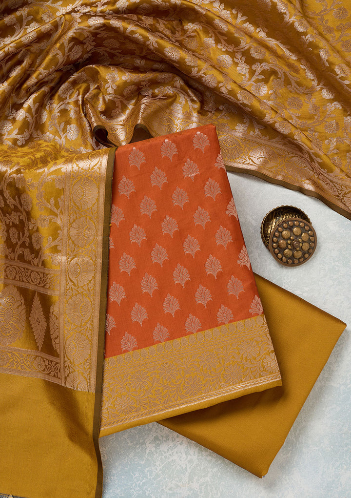 Rust Mustard Yellow Silk Bandhej Gold Zariwork Unstitched Dress Material With Matching Bottom And Dupatta