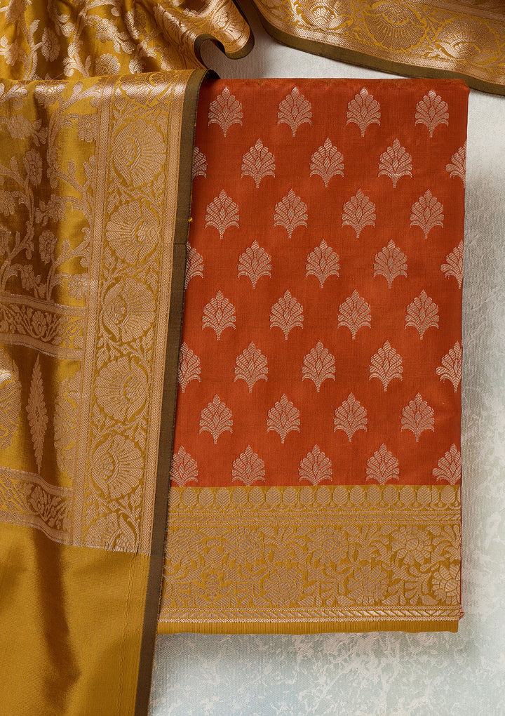 Rust Mustard Yellow Silk Bandhej Gold Zariwork Unstitched Dress Material With Matching Bottom And Dupatta