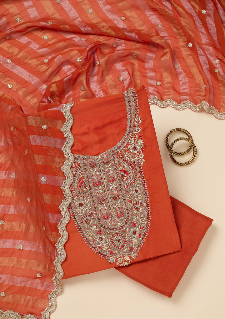 Rust Crepe Gold Zariwork Unstitched Dress Material With Matching Bottom And Dupatta