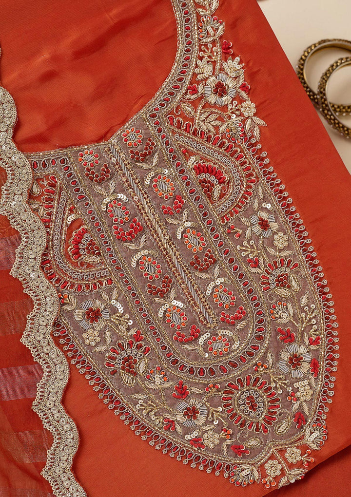 Rust Crepe Gold Zariwork Unstitched Dress Material With Matching Bottom And Dupatta