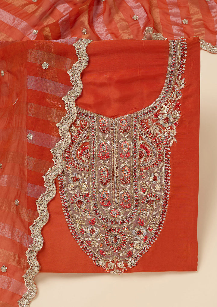 Rust Crepe Gold Zariwork Unstitched Dress Material With Matching Bottom And Dupatta