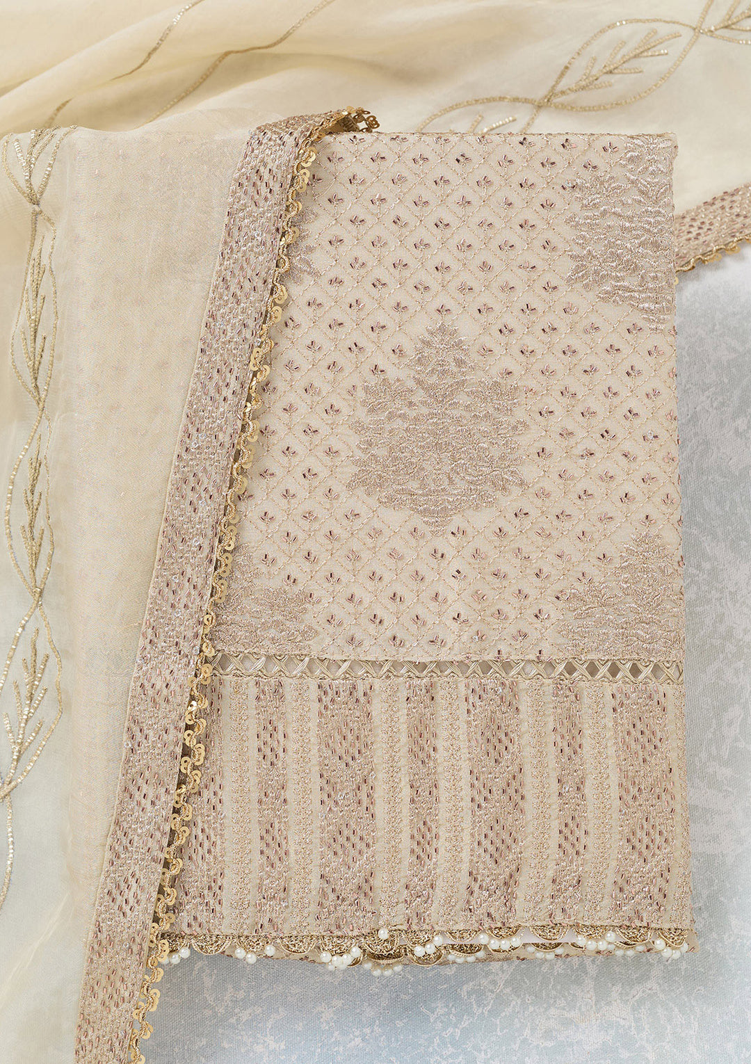 Cream Tissue Gold Zariwork Unstitched Dress Material With Matching Bottom And Dupatta