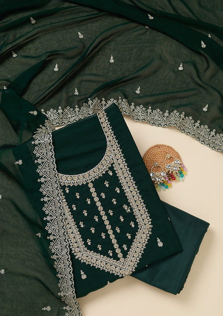 Bottle Green Soft Raw Silk Gold Zardozi Work Unstitched Dress Material With Matching Bottom And Dupatta