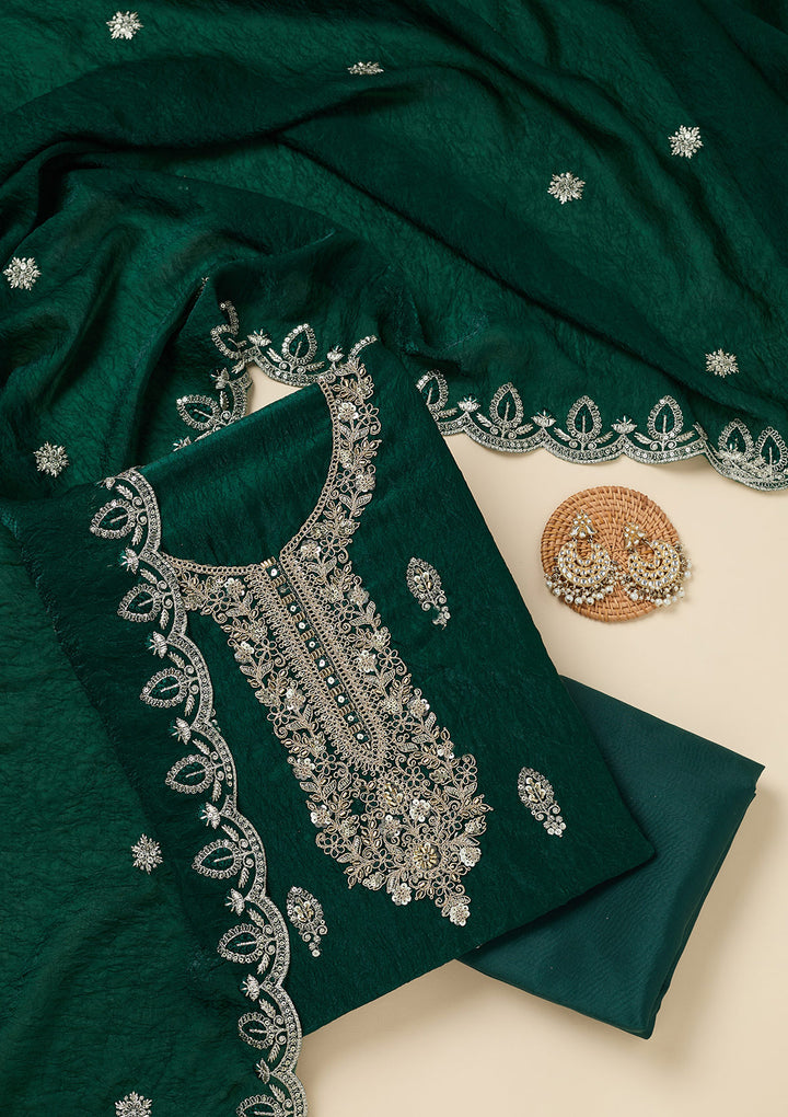 Bottle Green Soft Raw Silk Cutdana Unstitched Dress Material With Matching Bottom And Dupatta