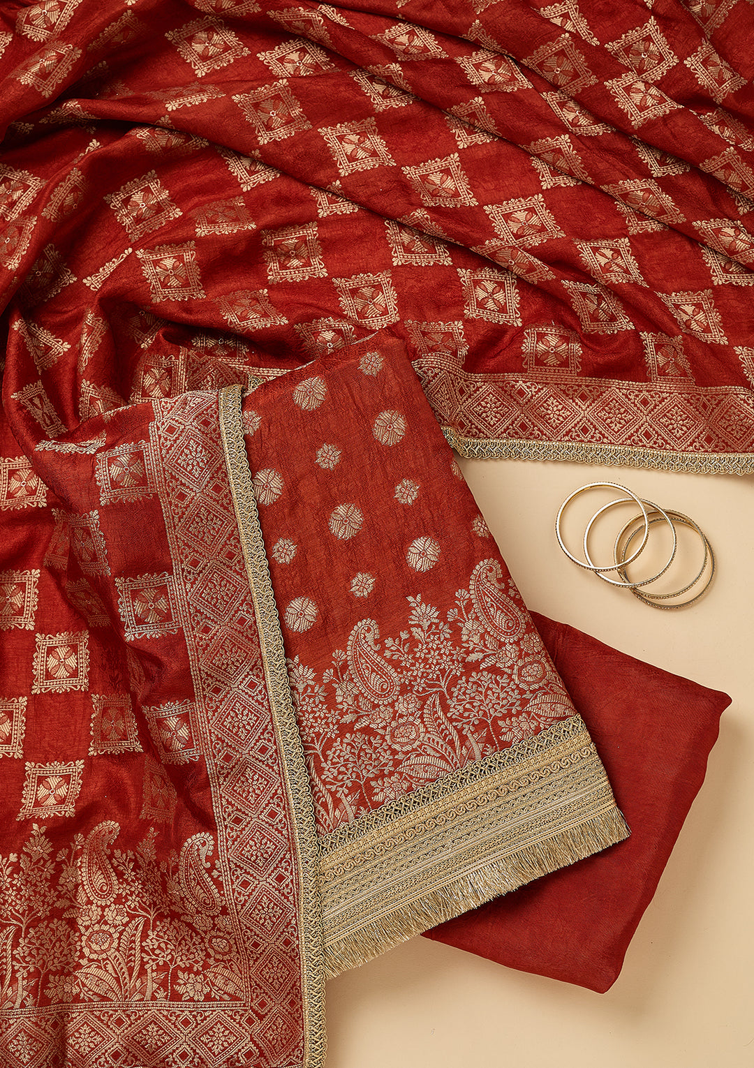 Rust Dola Silk Gold Zariwork Unstitched Dress Material With Matching Bottom And Dupatta