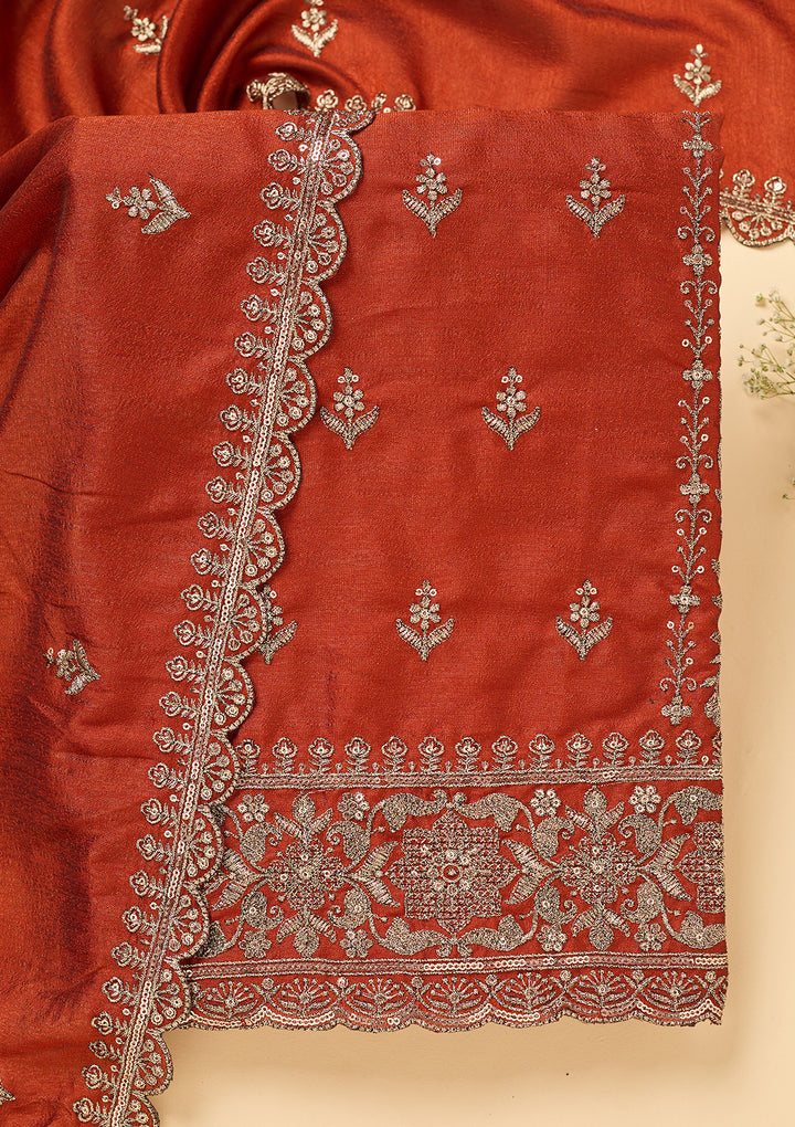 Rust Soft Raw Silk Antique Zardozi Unstitched Dress Material With Matching Bottom And Dupatta