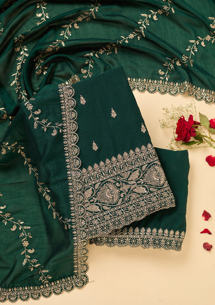 Bottle Green Soft Raw Silk Antique Zardozi Work Unstitched Dress Material With Matching Bottom And Dupatta