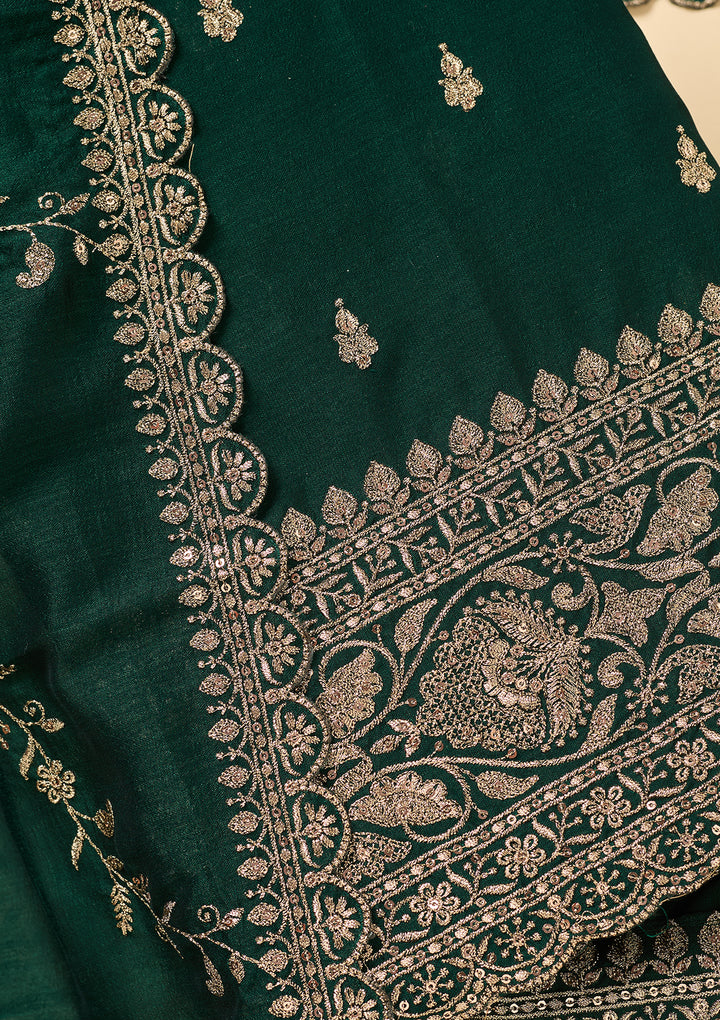 Bottle Green Soft Raw Silk Antique Zardozi Work Unstitched Dress Material With Matching Bottom And Dupatta