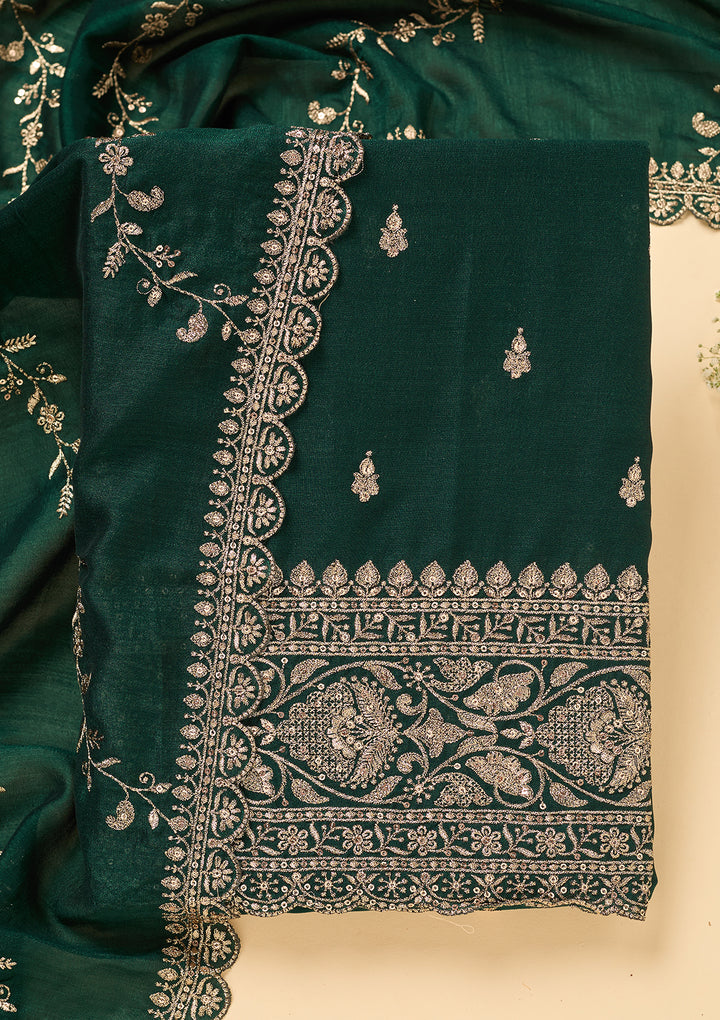 Bottle Green Soft Raw Silk Antique Zardozi Work Unstitched Dress Material With Matching Bottom And Dupatta