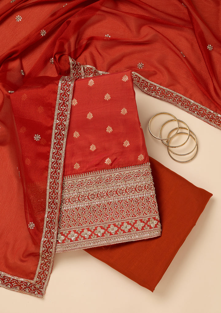 Rust Dola Silk Gold Zariwork Unstitched Dress Material With Matching Bottom And Dupatta