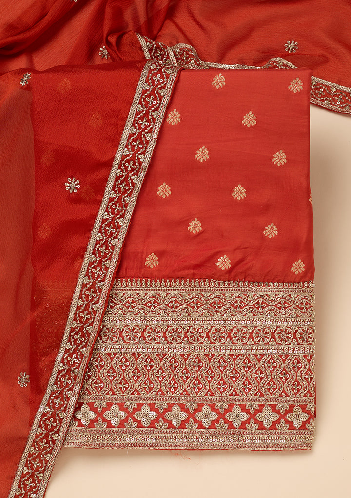 Rust Dola Silk Gold Zariwork Unstitched Dress Material With Matching Bottom And Dupatta