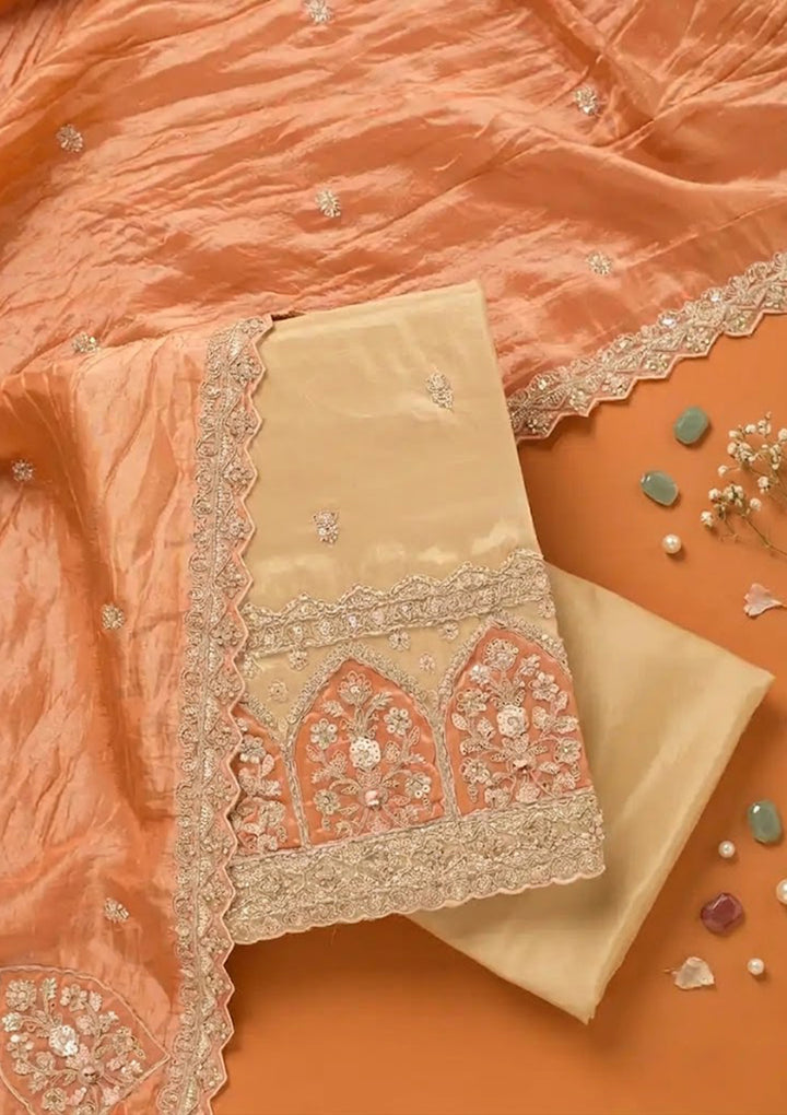 Beige Peach Tissue Cutdana Unstitched Dress Material With Matching Bottom And Dupatta