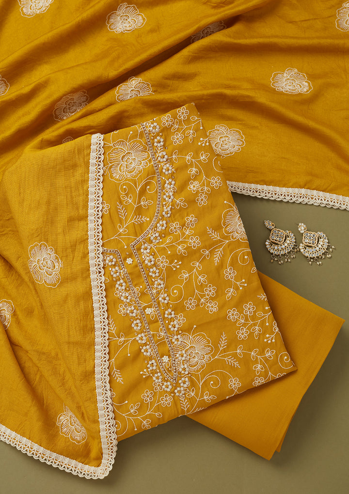 Mustard Yellow Crepe Pearlwork Unstitched Dress Material With Matching Bottom And Dupatta