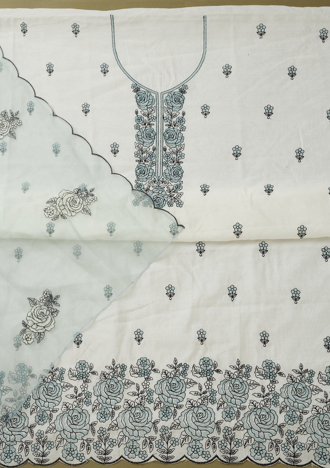 Off White Sea Green Dola Silk Threadwork Unstitched Dress Material With Matching Bottom And Dupatta