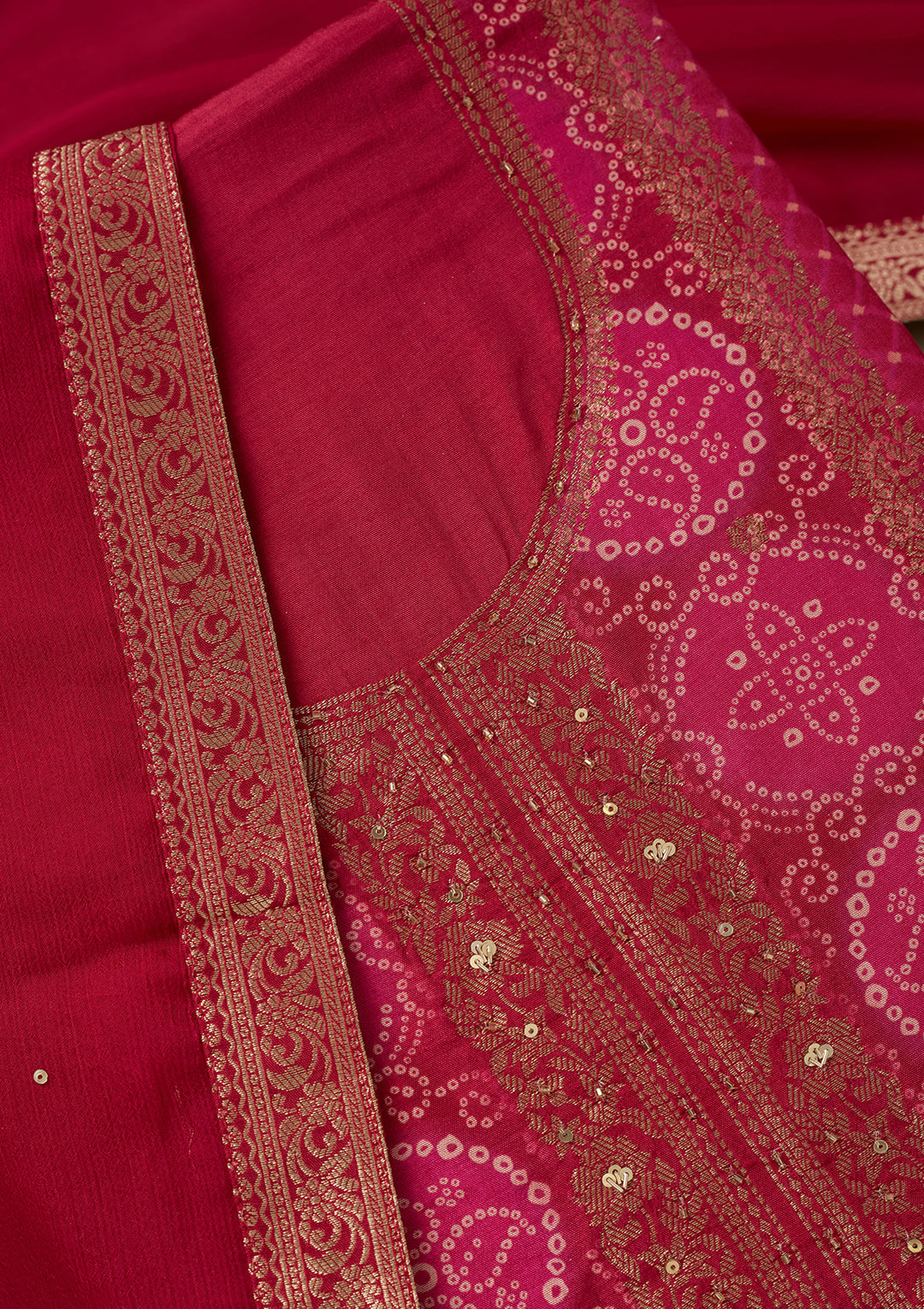 Magenta Pink Dola Silk Bandhej Gold Zariwork Unstitched Dress Material With Matching Bottom And Dupatta