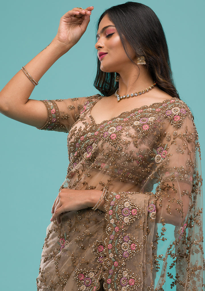 Beige Net Gold Zariwork Saree With Matching Blouse Piece