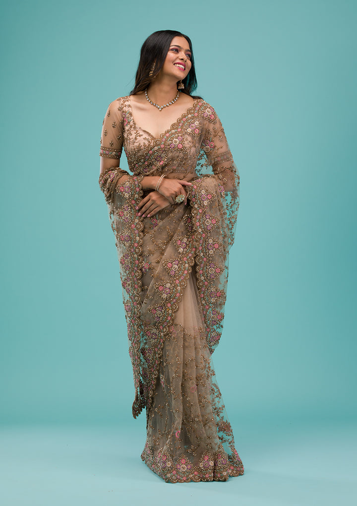 Beige Net Gold Zariwork Saree With Matching Blouse Piece