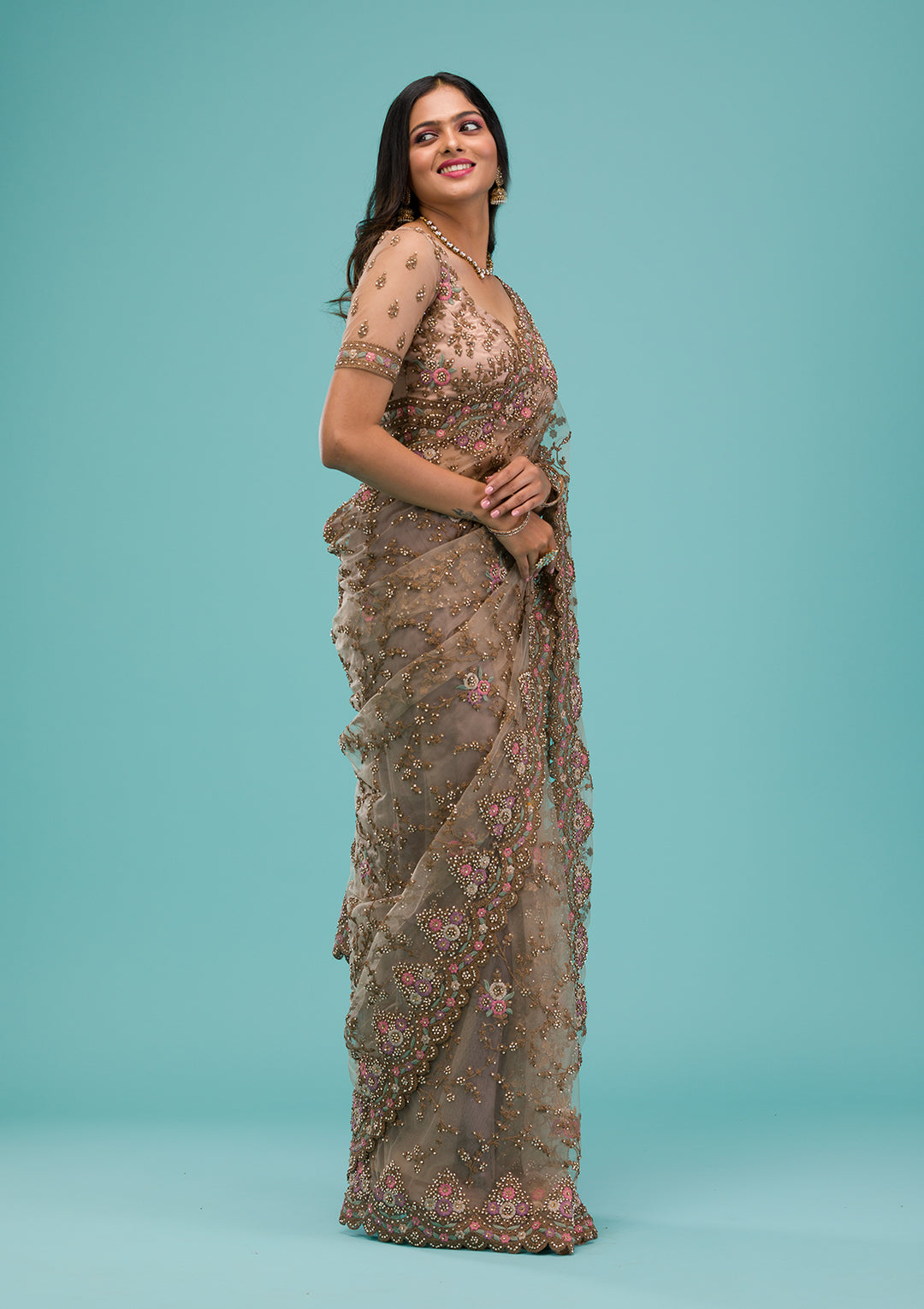 Beige Net Gold Zariwork Saree With Matching Blouse Piece