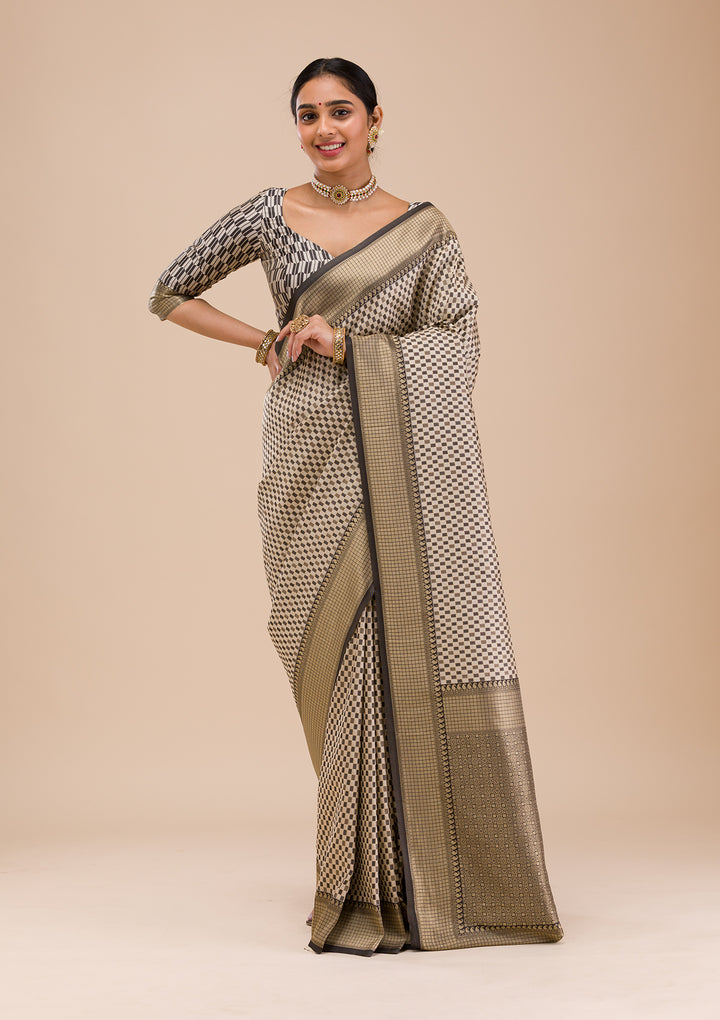 Koskii Orange Saree with Exquisite Threadwork – Traditional Elegance