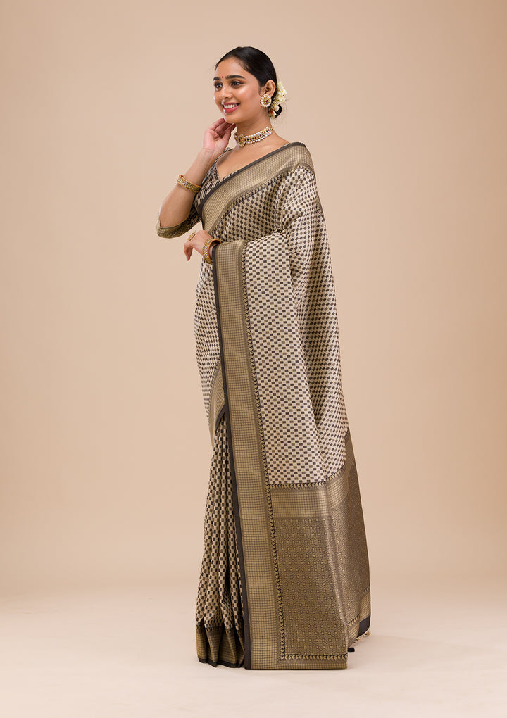 Koskii Orange Saree with Exquisite Threadwork – Traditional Elegance