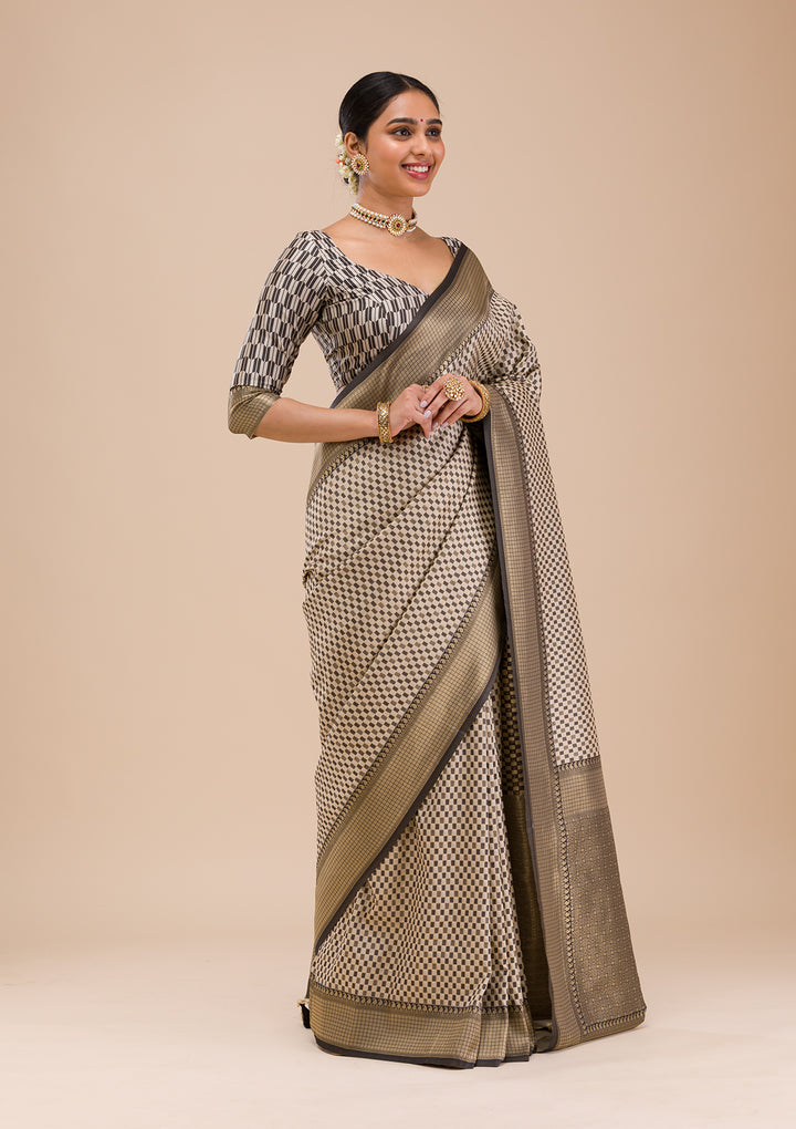 Koskii Orange Saree with Exquisite Threadwork – Traditional Elegance