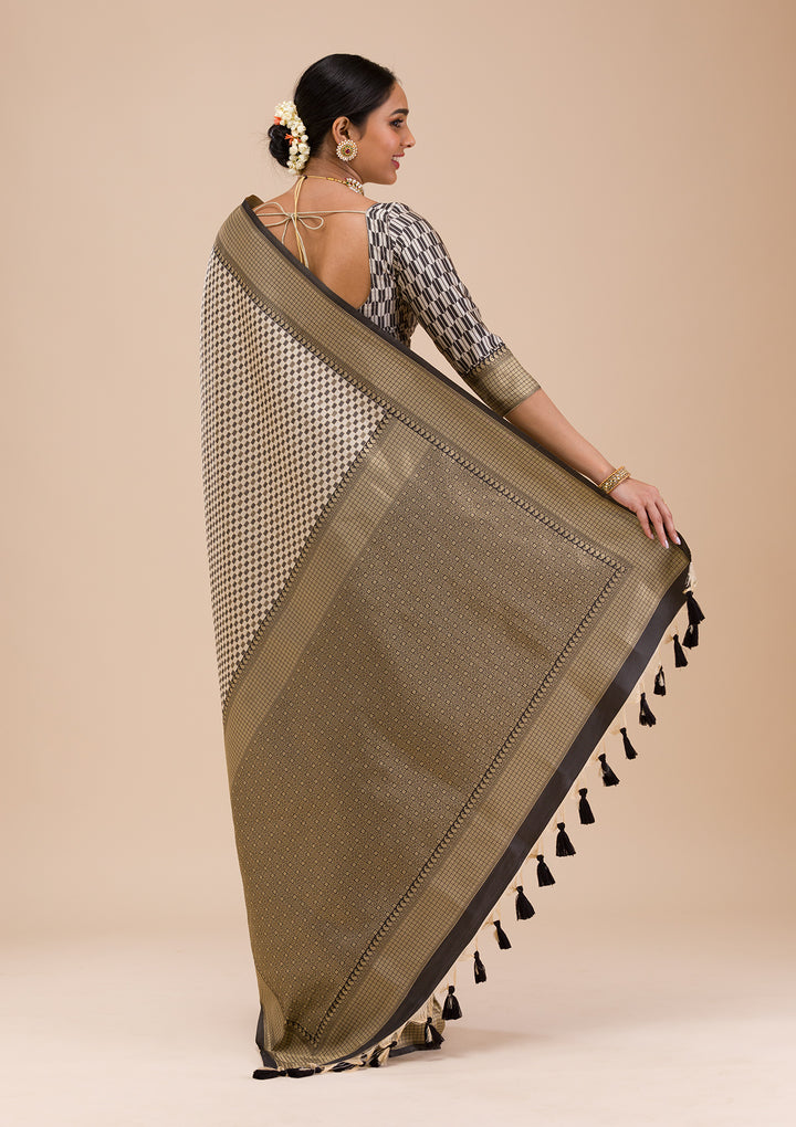 Koskii Orange Saree with Exquisite Threadwork – Traditional Elegance