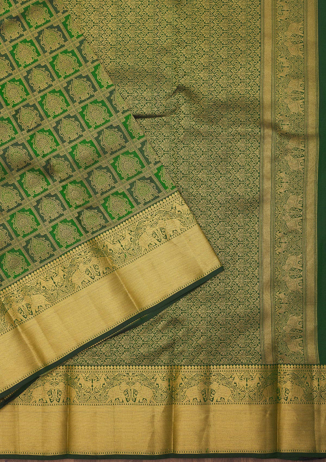 Bottle Green Pure Silk Jaal Gold Zariwork Saree With Matching Blouse Piece