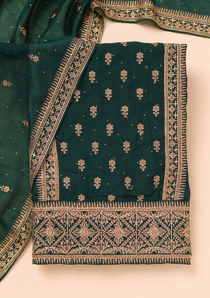 Bottle Green Soft Raw Silk Gold Zariwork Unstitched Dress Material With Matching Bottom And Dupatta