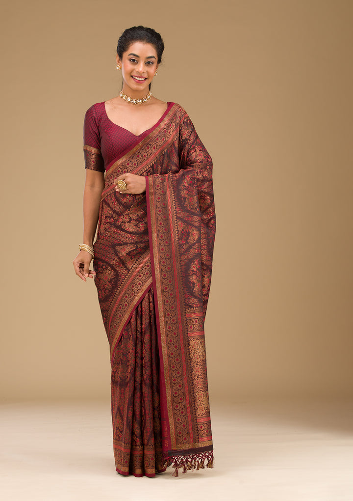 Koskii Orange Saree with Exquisite Threadwork – Traditional Elegance