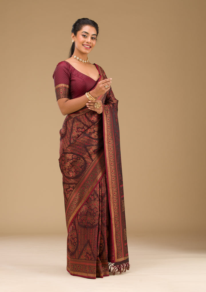 Koskii Orange Saree with Exquisite Threadwork – Traditional Elegance