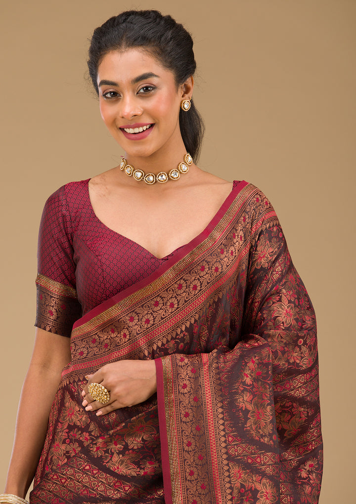 Koskii Orange Saree with Exquisite Threadwork – Traditional Elegance