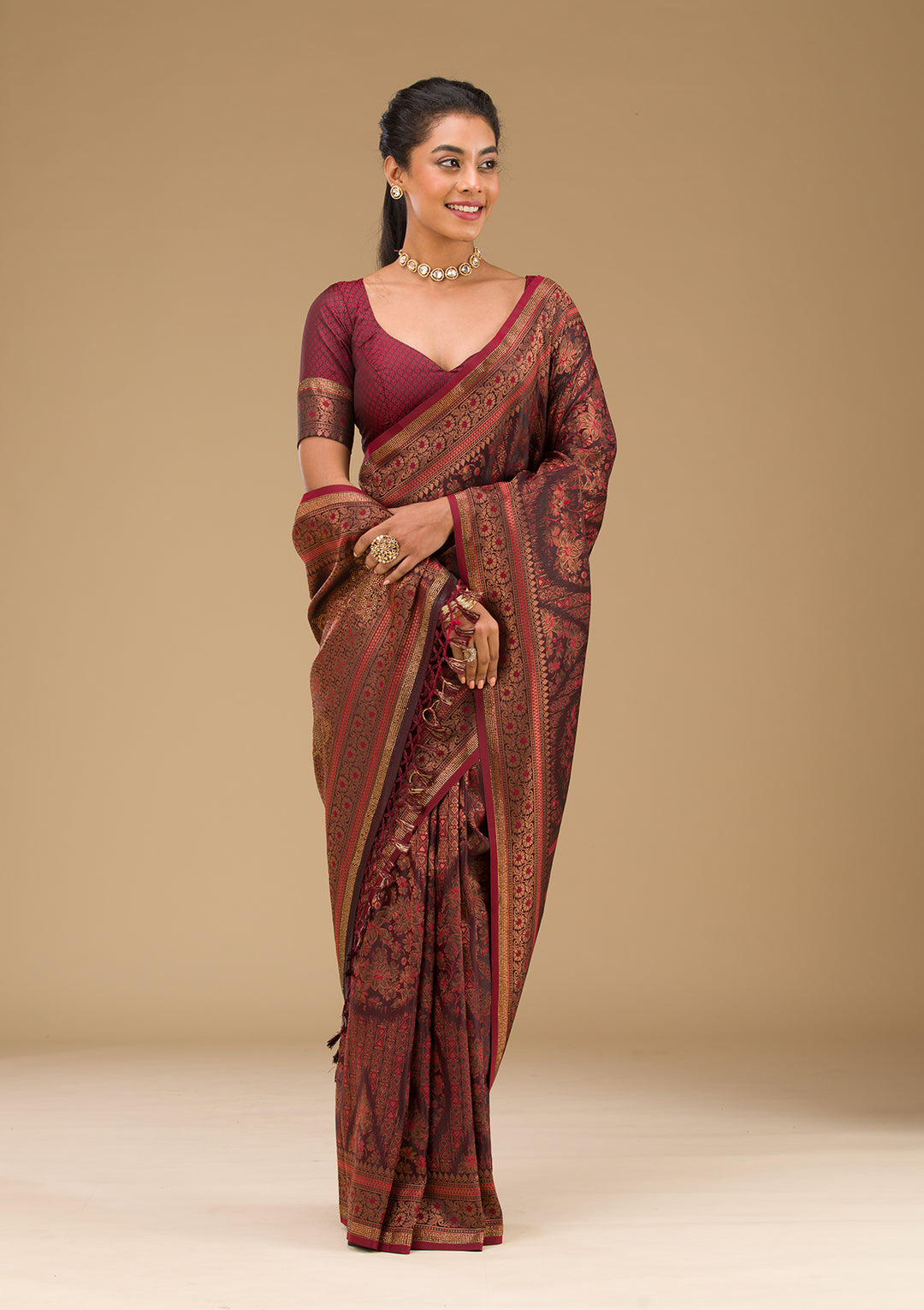 Koskii Orange Saree with Exquisite Threadwork – Traditional Elegance