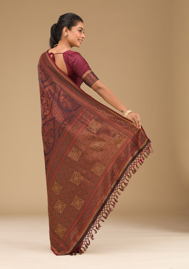 Koskii Orange Saree with Exquisite Threadwork – Traditional Elegance