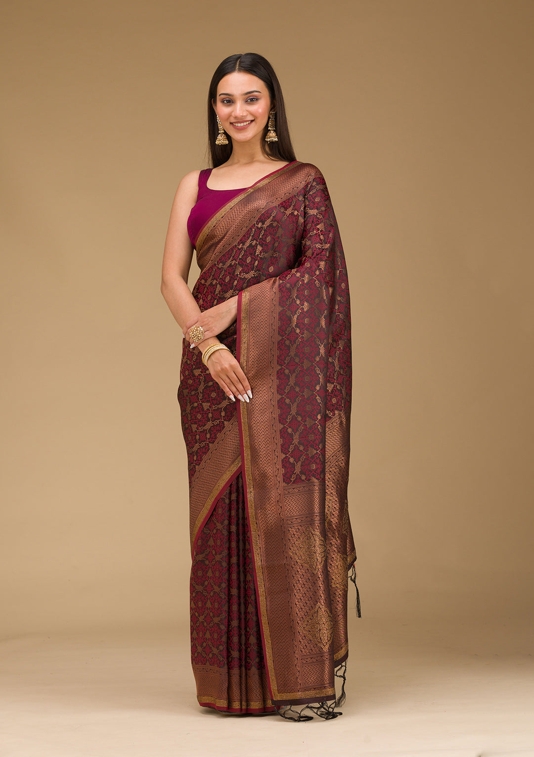 Koskii Orange Saree with Exquisite Threadwork – Traditional Elegance