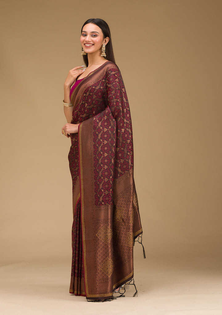Koskii Orange Saree with Exquisite Threadwork – Traditional Elegance