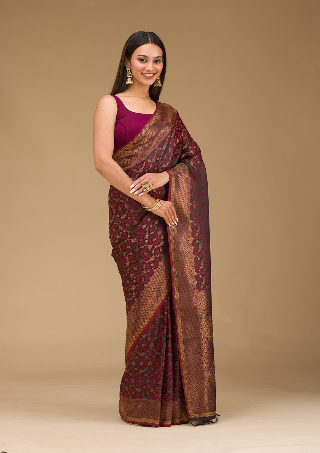 Koskii Orange Saree with Exquisite Threadwork – Traditional Elegance