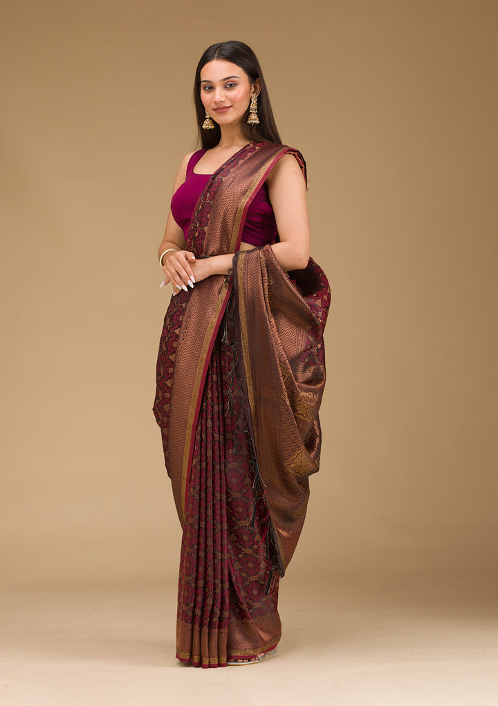 Koskii Orange Saree with Exquisite Threadwork – Traditional Elegance