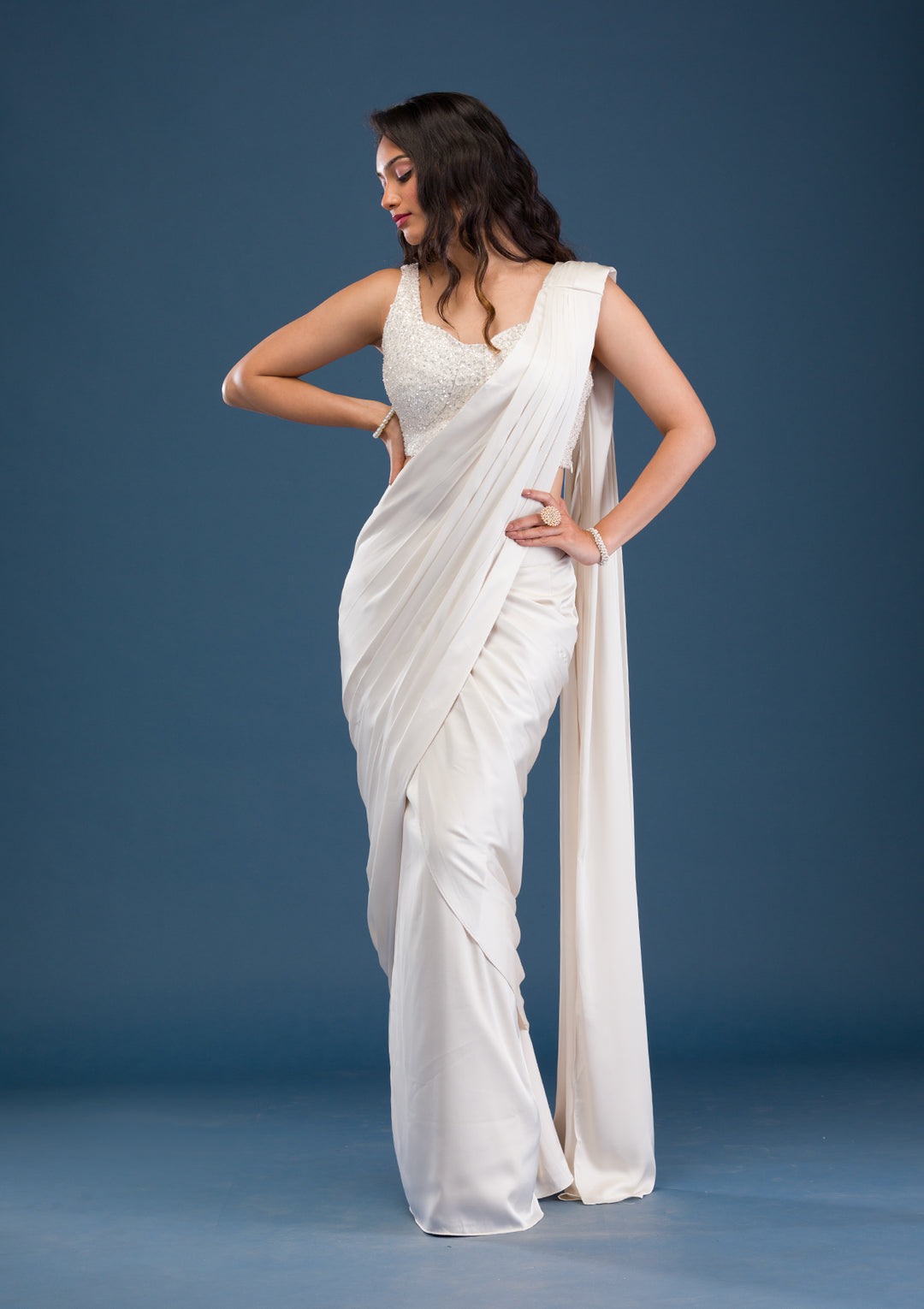 Koskii Satin Ivory Saree – Dazzle with Cutdana Embroidery