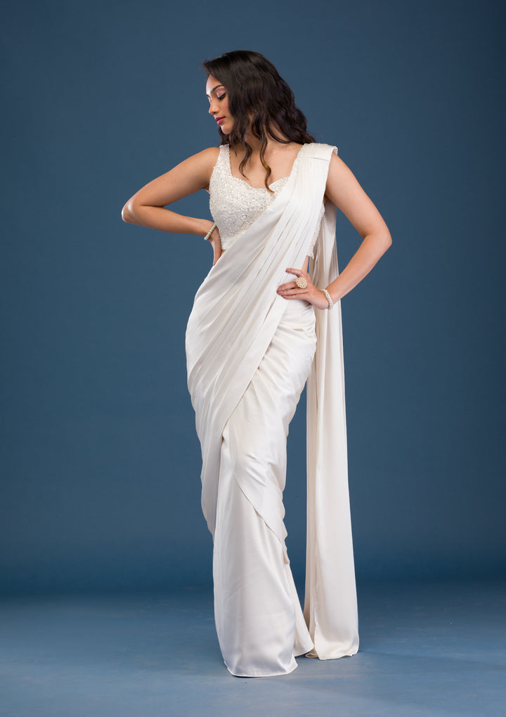 Koskii Satin Ivory Saree – Dazzle with Cutdana Embroidery