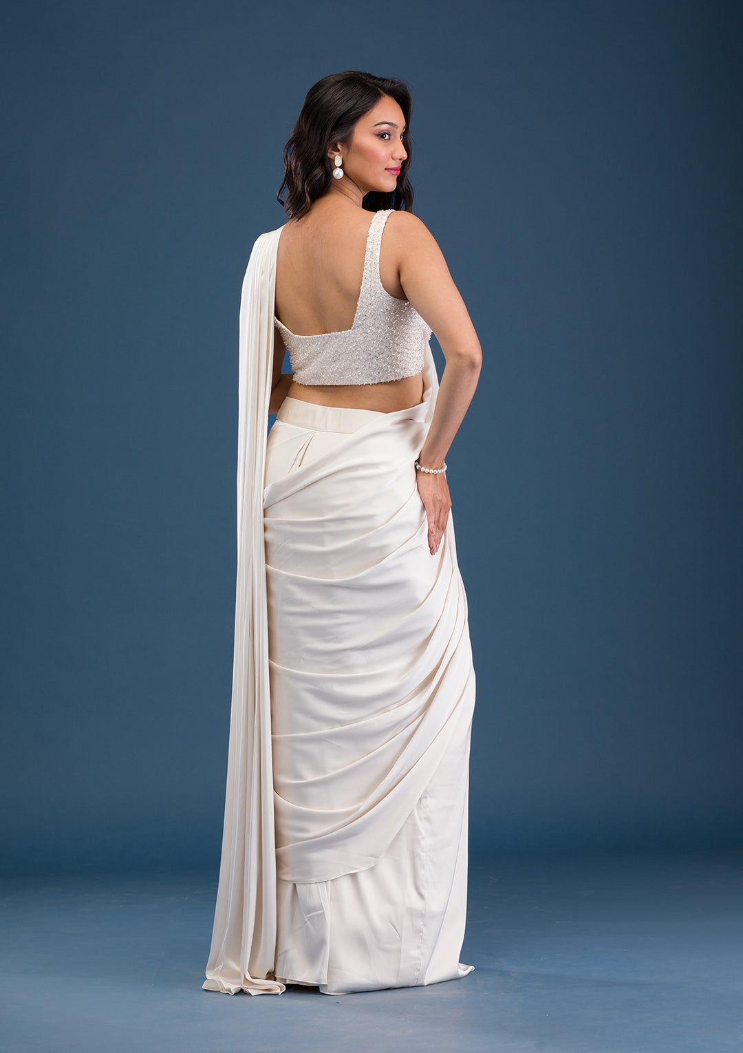 Koskii Satin Ivory Saree – Dazzle with Cutdana Embroidery