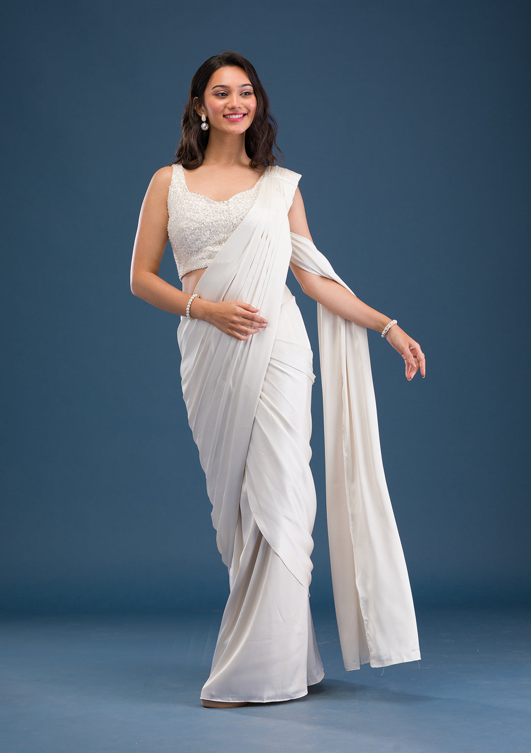 Koskii Satin Ivory Saree – Dazzle with Cutdana Embroidery