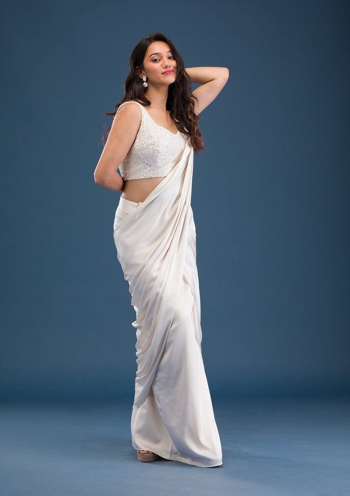 Koskii Satin Ivory Saree – Dazzle with Cutdana Embroidery