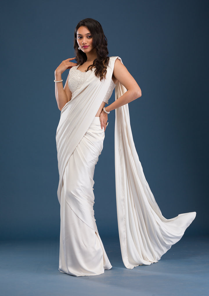 Koskii Satin Ivory Saree – Dazzle with Cutdana Embroidery