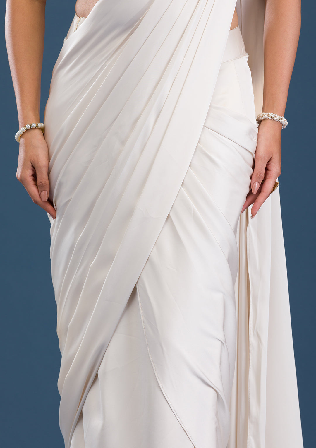 Koskii Satin Ivory Saree – Dazzle with Cutdana Embroidery