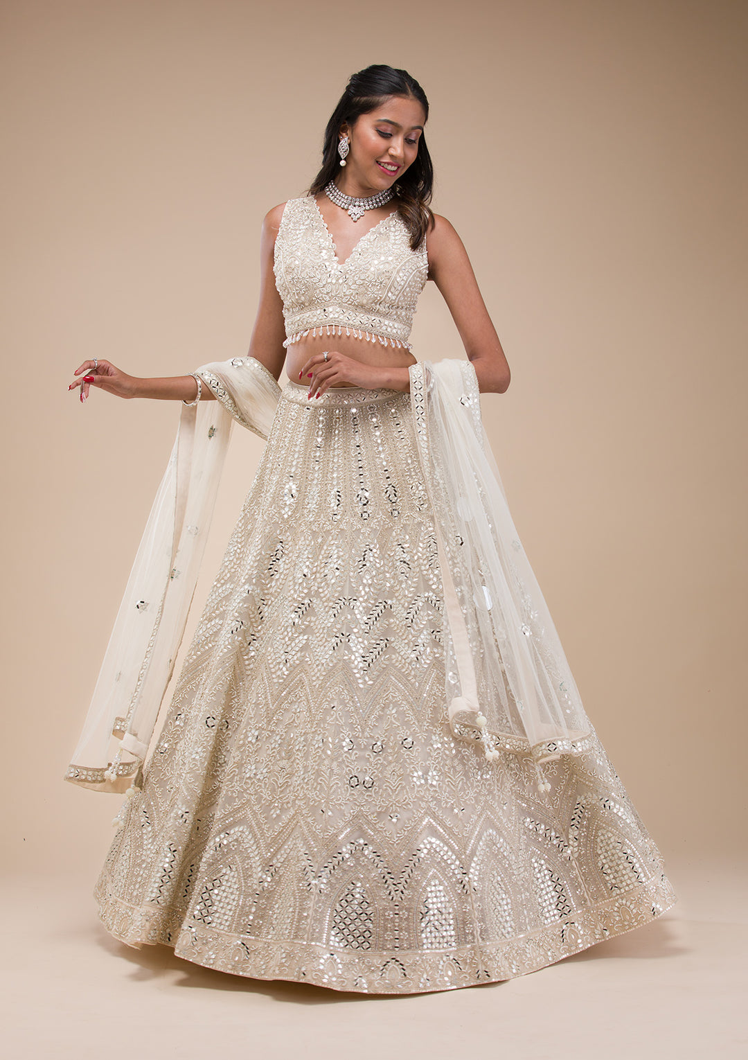 Koskii Net White Lehenga – Mirrorwork Elegance