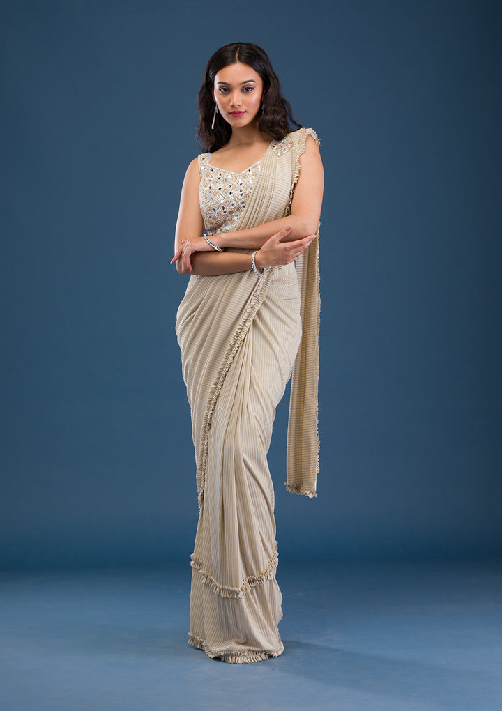 Koskii Beige Georgette Saree with Mirrorwork – Elegant Evening Wear