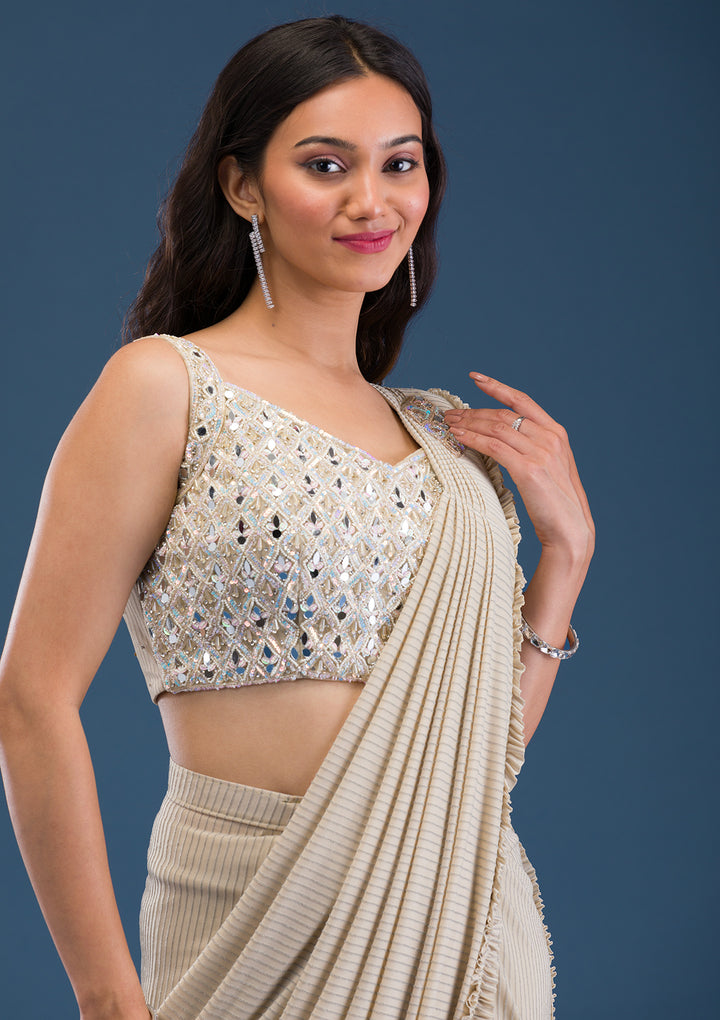 Koskii Beige Georgette Saree with Mirrorwork – Elegant Evening Wear