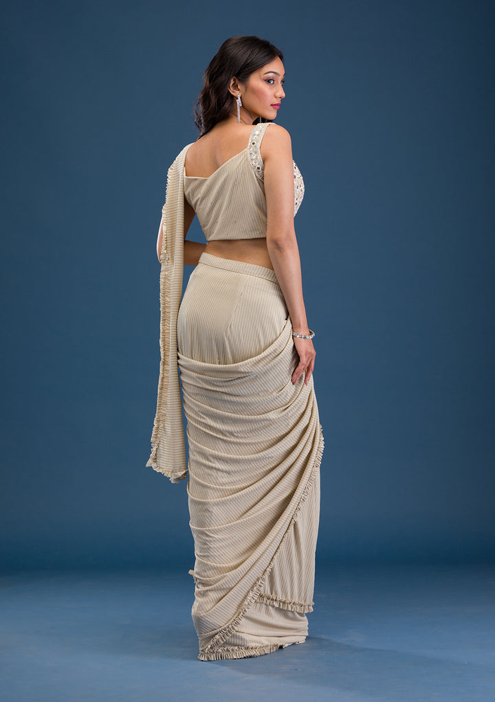 Koskii Beige Georgette Saree with Mirrorwork – Elegant Evening Wear