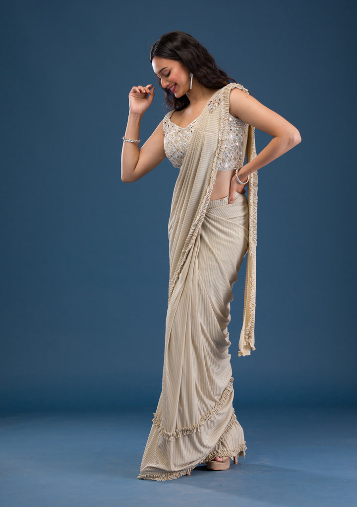 Koskii Beige Georgette Saree with Mirrorwork – Elegant Evening Wear
